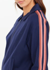 THE UPSIDE women’s navy Ananda Pari Zip Jacket is a true-to-size fit and features a zip-through front, front pockets and knitted stripes down sleeves. The perfect everyday piece.