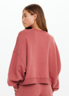 THE UPSIDE women’s red organic cotton Serendipity Paloma Crew is designed for a boxy fit and features drop shoulders and The Upside logo puff printed at the front. Made for everyday.