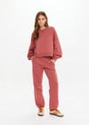 THE UPSIDE women’s red organic cotton Serendipity Harrison Track is a true-to-size fit and features an elasticated waistband and side seam pockets. Made for everyday.