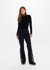 THE UPSIDE women’s black Hakuba Petra Zip Flare is a true-to-size fit and offers high water repellency, high breathability and bonded fleece underside for extra warmth. Designed for Après-ski and winter wear.