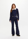 THE UPSIDE women’s navy Hakuba Kiki Ski Suit is a long sleeve full-length ski suit and features a zip opening, an elasticated removable belt and bonded fleece underside for extra warmth. Designed for Après-ski and winter wear.