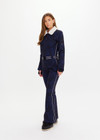 THE UPSIDE women’s navy Hakuba Kiki Ski Suit is a long sleeve full-length ski suit and features a zip opening, an elasticated removable belt and bonded fleece underside for extra warmth. Designed for Après-ski and winter wear.