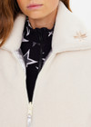 THE UPSIDE women’s silver metallic Lotti Reversible Puffer Jacket features a zip opening and pockets lined with polar fleece. Designed for Après-ski and winter wear.
