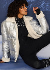 THE UPSIDE women’s silver metallic Lotti Reversible Puffer Jacket features a zip opening and pockets lined with polar fleece. Designed for Après-ski and winter wear.
