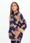 THE UPSIDE women’s organic cotton Mirage Carmen Quilted Jacket is an oversized fit and features a zip opening and pockets in our navy and tan geometric print. Made for lifestyle.
