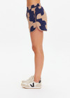 THE UPSIDE women’s organic cotton Mirage Quilted Mika Short is a regular fit and features an elasticated waistband and pocket in our navy and tan geometric print. Made for everyday wear.