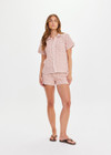 THE UPSIDE women's pink organic cotton Anoki Lovett Crochet Shirt has a relaxed fit with cream scalloped edges and pink pearlised shell buttons. Perfect for travel or everyday.