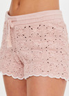 THE UPSIDE women's pink organic cotton Anoki Malik Crochet Short features an elastic waist with tassel braided drawcord and cream scalloped edge detailing. Perfect for travel or everyday.