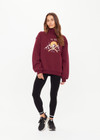 THE UPSIDE women’s maroon organic cotton Le Ski Clementine Crew is designed for an oversized fit and features Le Ski logo print & embroidery on front chest. Designed for Après-ski and winter wear.
