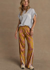 THE UPSIDE women’s floral Fantasy Roma Pant is a true-to-size fit and features an elasticated waistband with a drawcord, side pockets and cream side stripes. The perfect summer wardrobe piece.