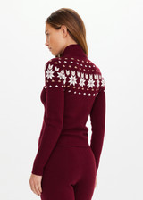 THE UPSIDE women’s maroon organic cotton Le Ski Blanche Half Zip features a zip through opening and a knitted snowflake design across chest and back. Designed for Après-ski and winter wear.