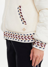 THE UPSIDE women’s cream Swiss Dhemi Knit Jacket features a zip through opening, removable sleeves and is lined with polar fleece. Designed for Après-ski and winter wear.