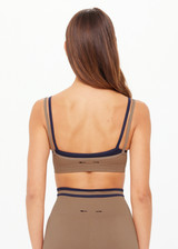 THE UPSIDE women’s mocha recycled Form Seamless Kelsey Bra is a double-layer mocha bra with navy contrast and moisture control. Made for yoga and pilates.