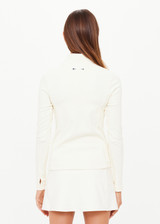 THE UPSIDE women's cream Courtship Dova Run Top is a form fitting long-sleeve and features a quarter zip opening with mock neck, thumb holes and invisible zip pockets. Made for running.