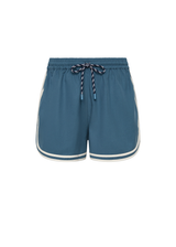 THE UPSIDE women's blue Klio Short is designed for a mid-rise, relaxed fit and features a soft elasticated waistband with drawcord and contrast binds in cream along curved hem. Made for everyday.