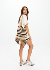 THE UPSIDE women's stripe Bohemia Kelly Crochet Bag is an organic hand-crochet tote with knotted tassel details and wooden beads. Made for lifestyle.