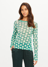 THE UPSIDE women's green Latania Ada Long Sleeve Knit is regular fit with a geometric print and striped knitted rib neckline. Made for lifestyle.
