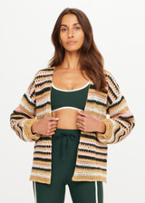 THE UPSIDE women's stripe Bohemia Mari Crochet Jacket offers a relaxed fit with elasticated cuffs and striped design in pink, green, cream, and tan. Made for lifestyle.