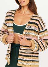 THE UPSIDE women's stripe Bohemia Mari Crochet Jacket offers a relaxed fit with elasticated cuffs and striped design in pink, green, cream, and tan. Made for lifestyle.