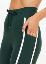 THE UPSIDE women's green Santa Fe 25inch Legging is soft, supportive with cream side seam and hem bindings, and side pockets. Made for yoga & pilates.