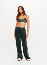 THE UPSIDE women's green Marnie Silk Wide Leg Pant is true to size with high-rise fit, elasticated waistband, and cream side seam bindings. Made for lifestyle.