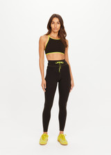 THE UPSIDE women's olive jacquard Castilla 25 Inch Midi Pant is designed for a soft and comfortable fit and features mid-rise with lime elastic drawcord. Made for yoga and pilates.
