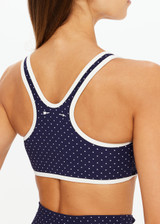 THE UPSIDE women's polka dot Spellbound Jade Racerback Bra is supportive and comfortable with removable cups and contrast cream bindings. Made for yoga & pilates.