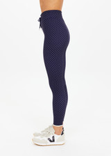 THE UPSIDE women's polka dot Spellbound 25inch Legging is supportive and comfortable with recycled rib fabric, elastic drawcord, and cream aglet ends. Made for yoga & pilates.