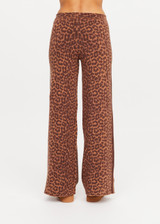 THE UPSIDE women's leopard organic cotton Malawi Freya Knit Pant is true-to-size and features a elasticated waistband with drawcord and short splits at hem. Made for everyday.