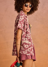 THE UPSIDE women's floral organic cotton Lahaina Cabana Zip Shirt features front patch pockets with zippers. Made for lifestyle.