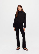 THE UPSIDE women's black Ace Shell Jacket is a water-resistant cropped zip-through jacket and features front pockets and an adjustable drawcord at waist. Made for running.