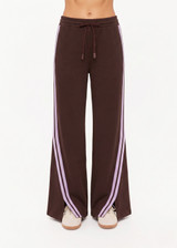 THE UPSIDE women's brown Roma Pant features a high rise with an elasticated waistband, pockets, and a side stripe with lilac mesh. Made from recycled double faced single jersey fabrication. Made for lifestyle.