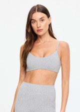 THE UPSIDE women's grey cotton Flash Scoop Neck Sports Bra offers low coverage with a scooped sweetheart neckline, soft support, and binded straps with adjusters. Made for yoga & pilates.