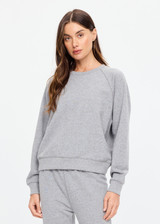 THE UPSIDE women's grey cotton Hit The Road Track Top is a relaxed raglan crew neck sweater in french terry fabrication with a ribbed neckline, arms and cuffs. Made for lifestyle.