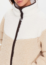 THE UPSIDE women's natural Harlow Fleece Zip Through is designed for a relaxed fit in a warm fleece fabrication and features an elastic waist and cuffs and zip pockets. Made for lifestyle.
