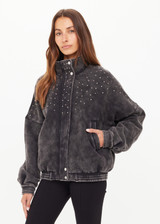 THE UPSIDE women's washed black Cosmic Carmen Moto Jacket is designed for a relaxed fit and features silver meta snap buttons, welt pockets and a soft elasticated hem. Perfect everyday outerwear piece.