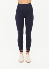 THE UPSIDE women's navy Form Seamless 25inch Legging is firm and supportive and features contrast tan stripes. Made for yoga & pilates.