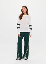 THE UPSIDE women's cream organic cotton Fenway Sebastian Crew offers a relaxed fit and features The Upside logo knit detail on back in green. Made for lifestyle.