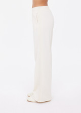 THE UPSIDE women's cream Navar Marnie Wide Leg Pant is a high-rise wide leg fit in our castilla "TU" design and features an elasticated waistband and side seam pockets. Made for everyday wear.