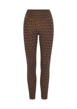 THE UPSIDE women's navy & camel recycled jacquard Castilla 25inch Legging is high-rise with a V panel waistband. Made for yoga & pilates.