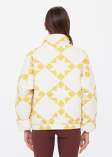 THE UPSIDE women's yellow organic cotton Etoile Carmen Quilted Jacket fits oversized and features front pockets, an elasticated hem and zip through opening. Made for lifestyle.
