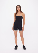 THE UPSIDE women's black recycled rib Rhythm Caleb Tank Top features a shelf bra with removable cups and cream and mocha binds along neckline. Made for yoga & pilates.