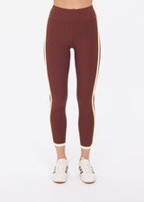THE UPSIDE women's brown recycled rib Rhythm 25inch Legging has a mid-rise fit and features cream and yellow binds along side seams. Made for yoga & pilates.