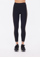 THE UPSIDE women's black recycled rib Rhythm 25inch Legging has a mid-rise fit and features cream and mocha binds along side seams. Made for yoga & pilates.