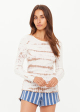 THE UPSIDE women's organic cotton rib Ayla Chrissy Long Sleeve Top is designed for a slim fit and features a brown hand tie dye design on a cream base. Made for lifestyle.