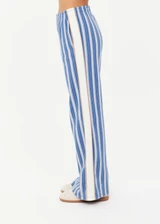 THE UPSIDE women's blue stripe Palmas Marnie Wide Leg Pant offers a high-rise, wide leg fit and features an elasticated waistband and side pockets. Made for lifestyle.
