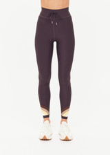 THE UPSIDE women's grey recycled soft peached Kefi 25inch Legging is designed for a mid-rise fit, with an elastic drawcord and aglet ends, crafted with a panelled rainbow feature at the hem. Made for yoga & pilates.