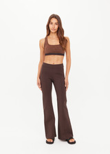 THE UPSIDE women's brown Joyela Flare Pant features a mid rise, full length flare pant with heavy ponte fabrication and a soft elastic waistband. Made for lifestyle.