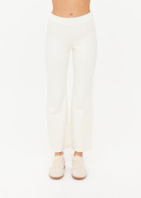 THE UPSIDE women's cream Bonnie Kick Flare Pant is a mid-rise, cropped flare pant made in a heavy ponte fabrication with a soft elastic waistband and embroidered arrow logo at back.