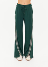 THE UPSIDE women's green Roma Pant is a highwaisted, true-to-size fit made in double-faced jersey and features contrast tape down side seams, side pockets and an elasticated waistband with drawcord.